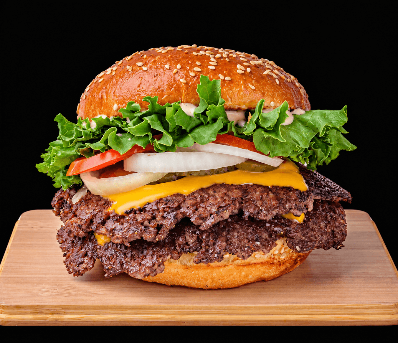 Proper Burger OG Double photographed on a wooden board.